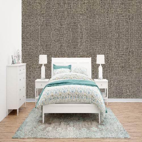 Bedroom with a white bed, nightstands, and dresser against a textured gray wall.