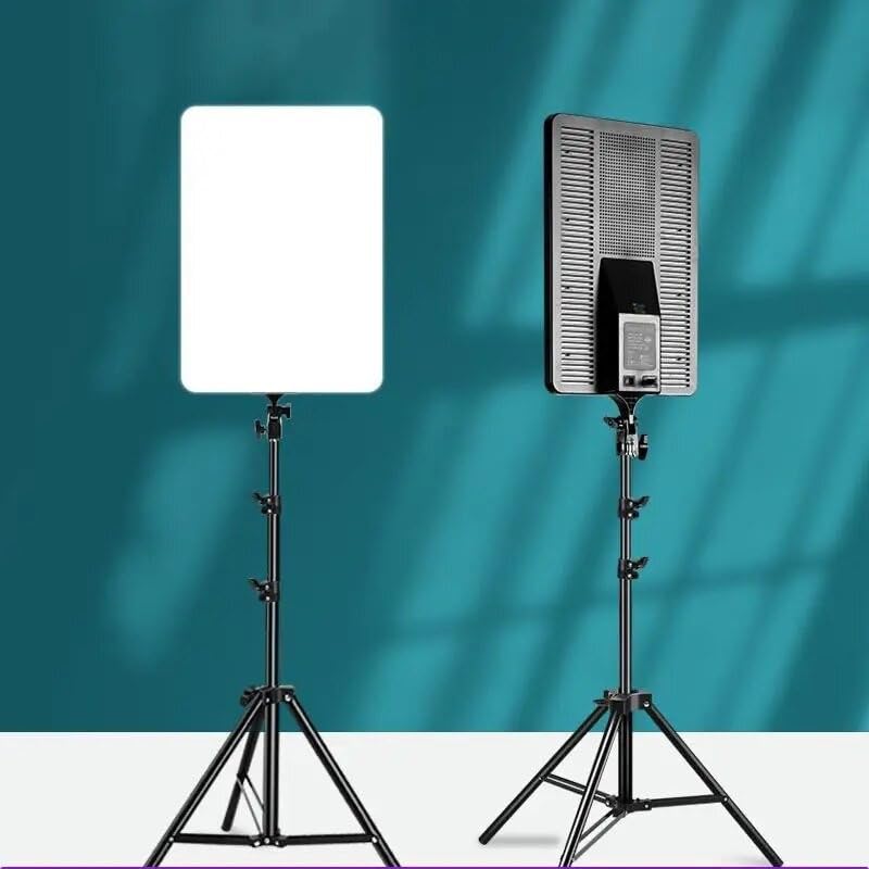 Two LED video light panels on tripods, one with a white light-emitting surface and the other with a grid attached. Both are positioned against a blue background.