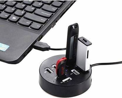 This is a black, circular USB hub, likely a USB 2.0 or 3.0 model, with eight ports. It features a built-in cable for connecting to a computer. The product is shown in several contexts: connected to a laptop with flash drives and card readers plugged in, and as a diagram demonstrating its use with various devices like desktops, laptops, smartphones, and keyboards. One image highlights the "DC hole of power supply" on the side of the hub, indicating it is a powered hub. The product is branded with the text "h