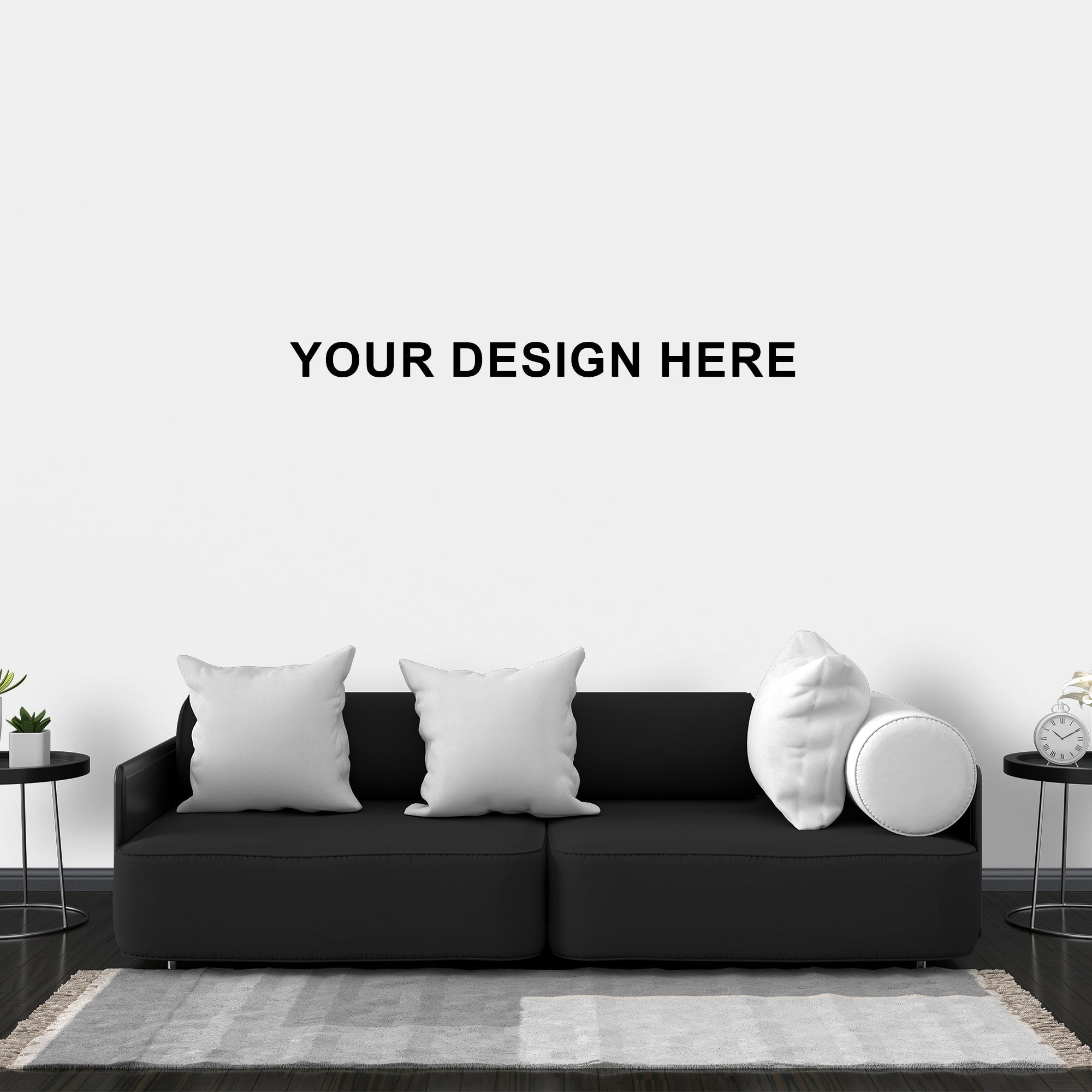 Black sofa with decorative pillows in a minimalistic living room setting