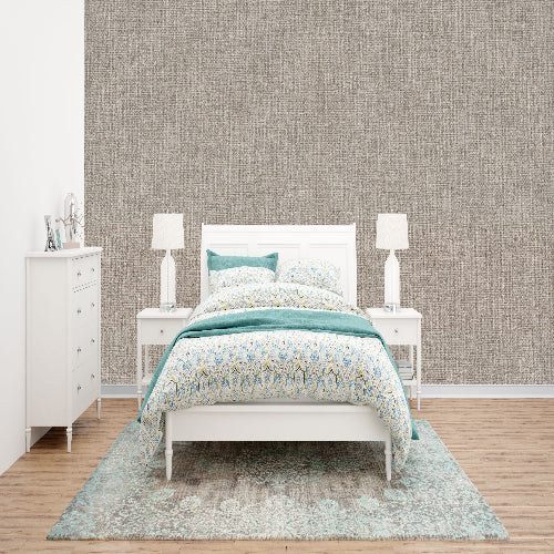 Bedroom with a white bed, nightstands, and dresser against a textured wall.