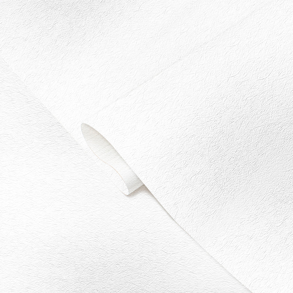 White ceramic knife on a white textured background