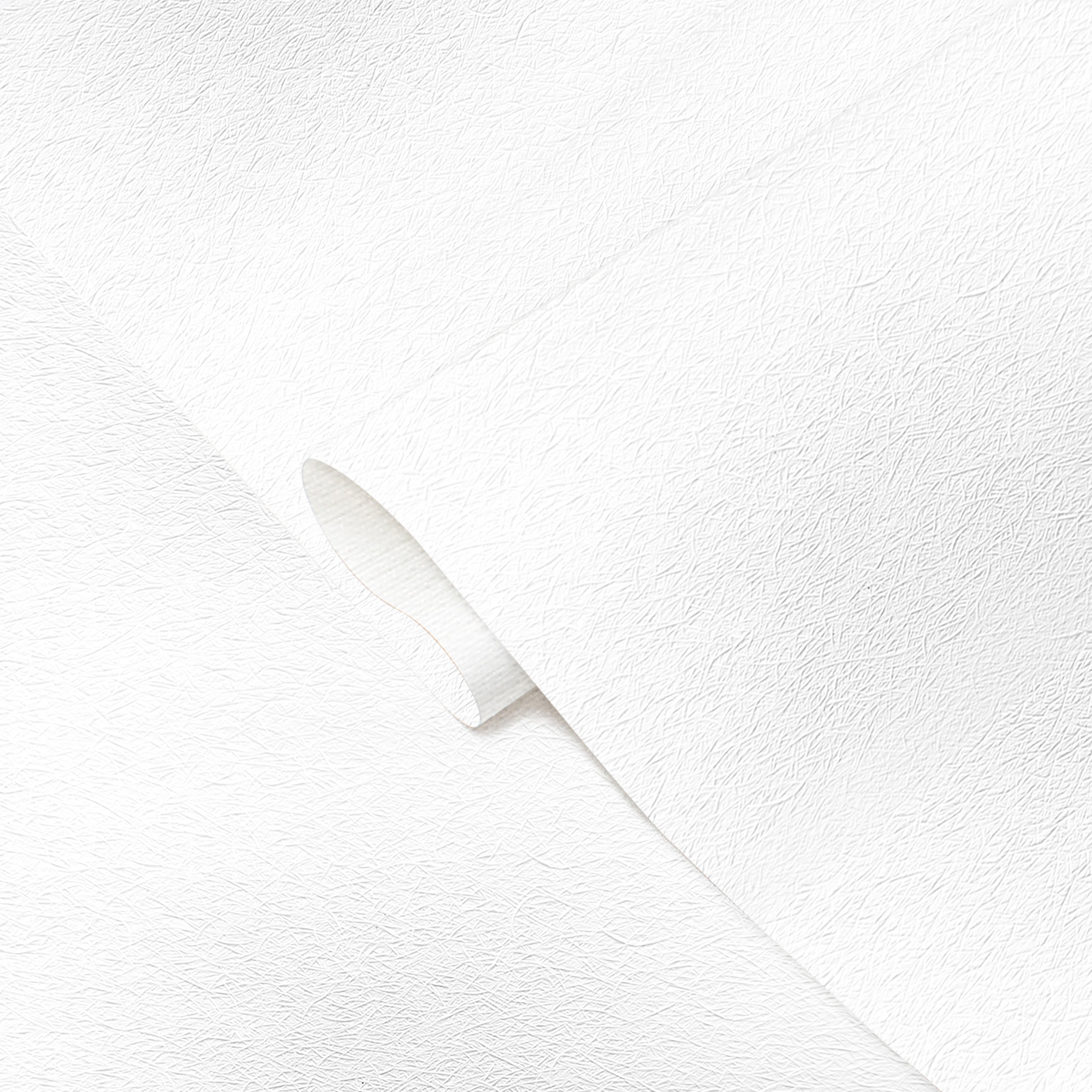 White ceramic knife on a white textured background