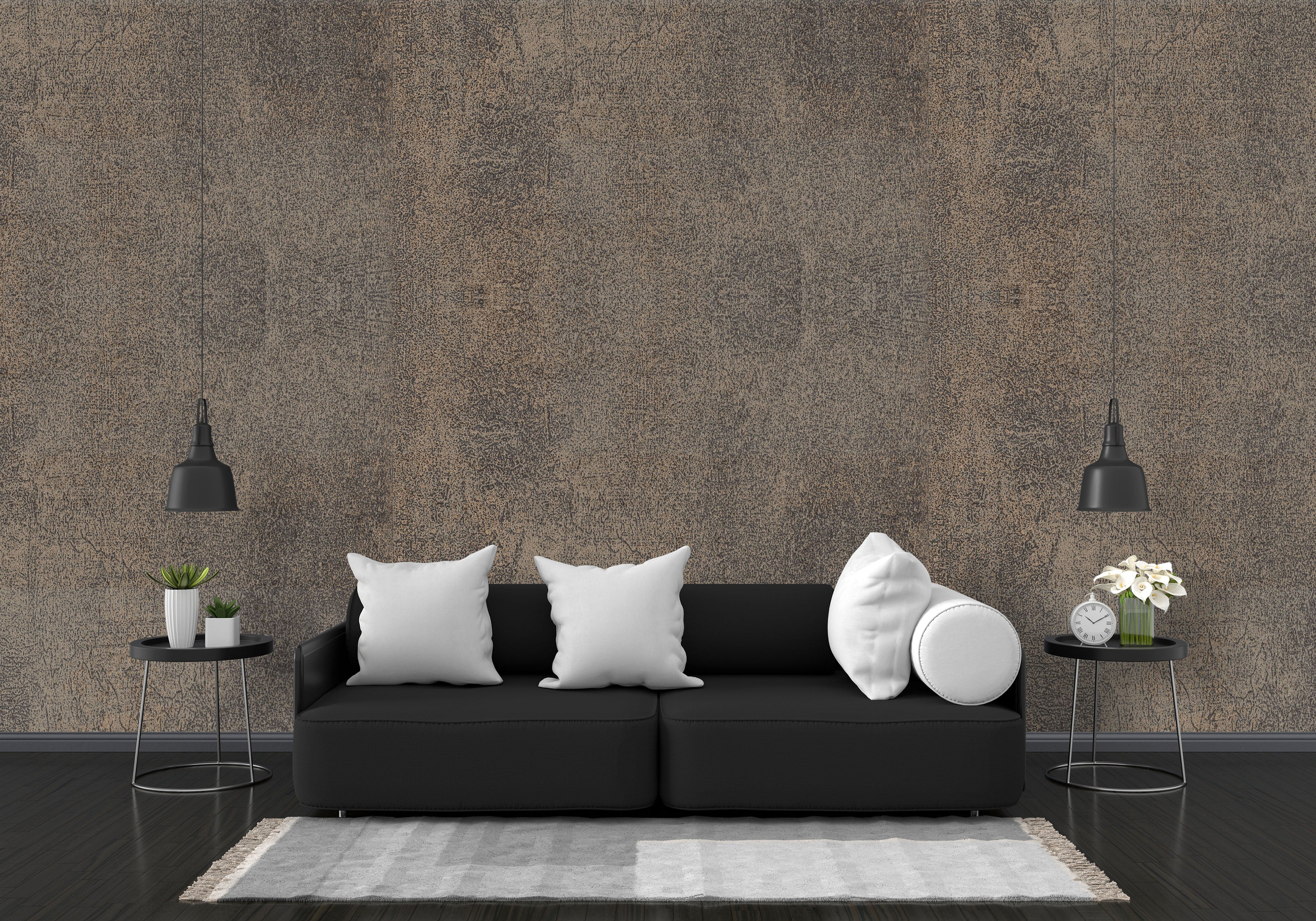 Modern living room with a black sofa, white pillows, and decorative items against a textured brown wall.