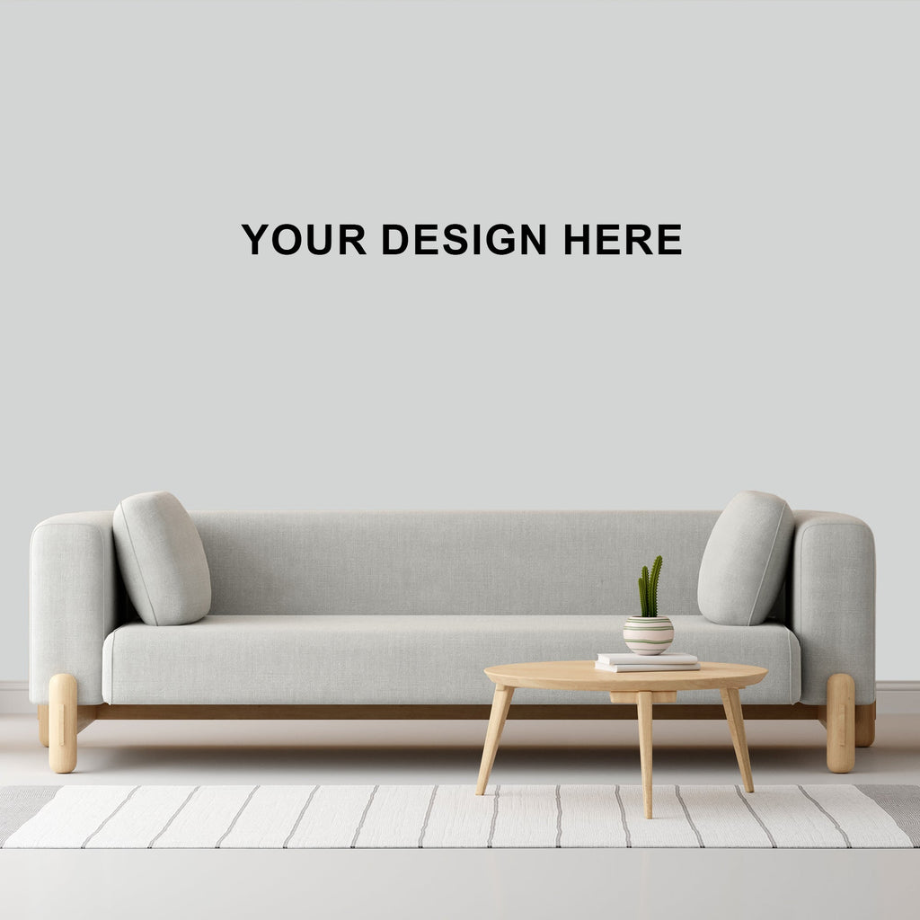 Gray sofa with a wooden coffee table on a light gray floor and wall