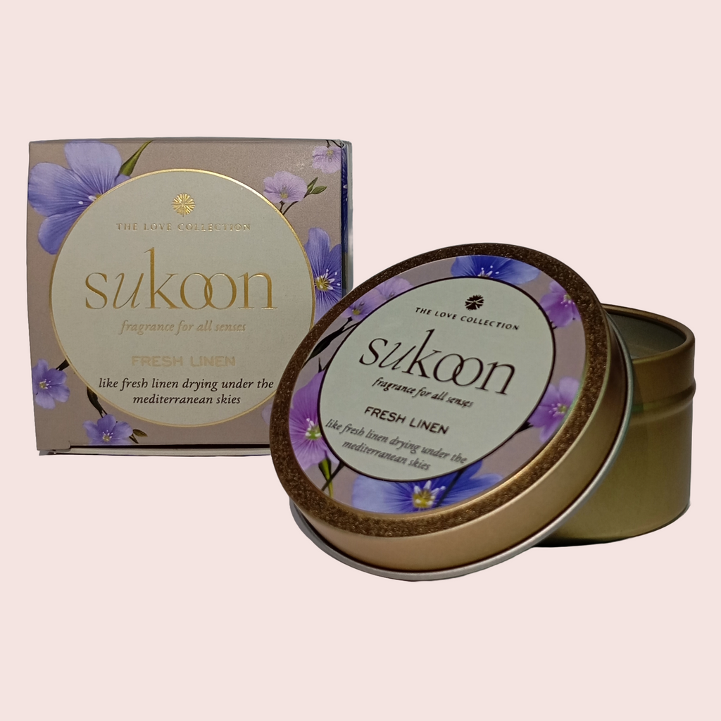 Sukoon Fresh Linen fragrance tin and packaging on a beige background