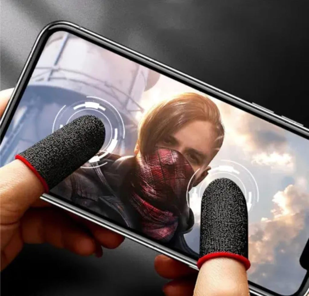 Person using a smartphone with textured finger covers on a blurred background