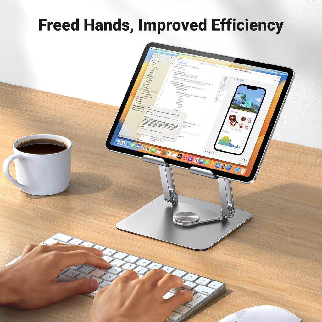Tablet on a stand with a keyboard and coffee cup on a wooden desk, emphasizing freed hands and improved efficiency.
