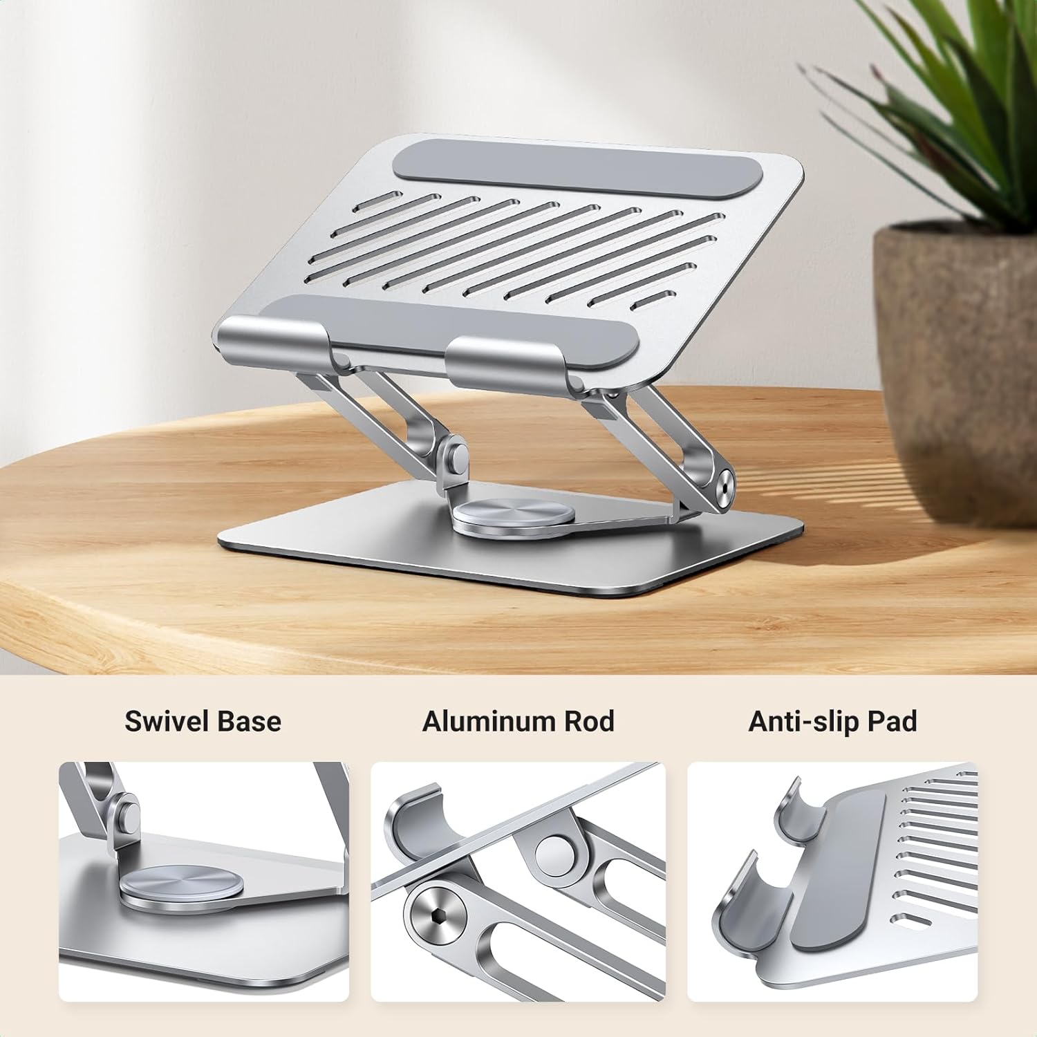 Silver laptop stand on a wooden surface with product features highlighted.