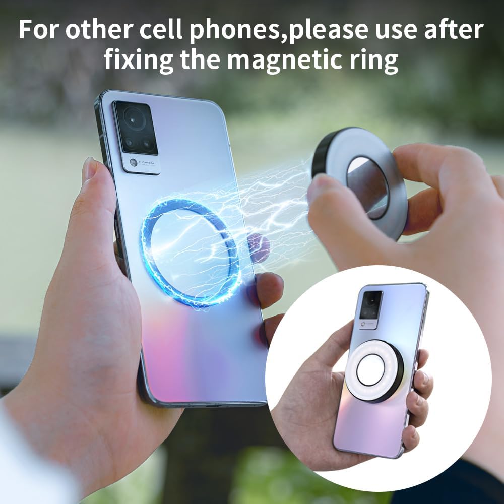 Person holding a phone with a magnetic ring attachment, outdoors.