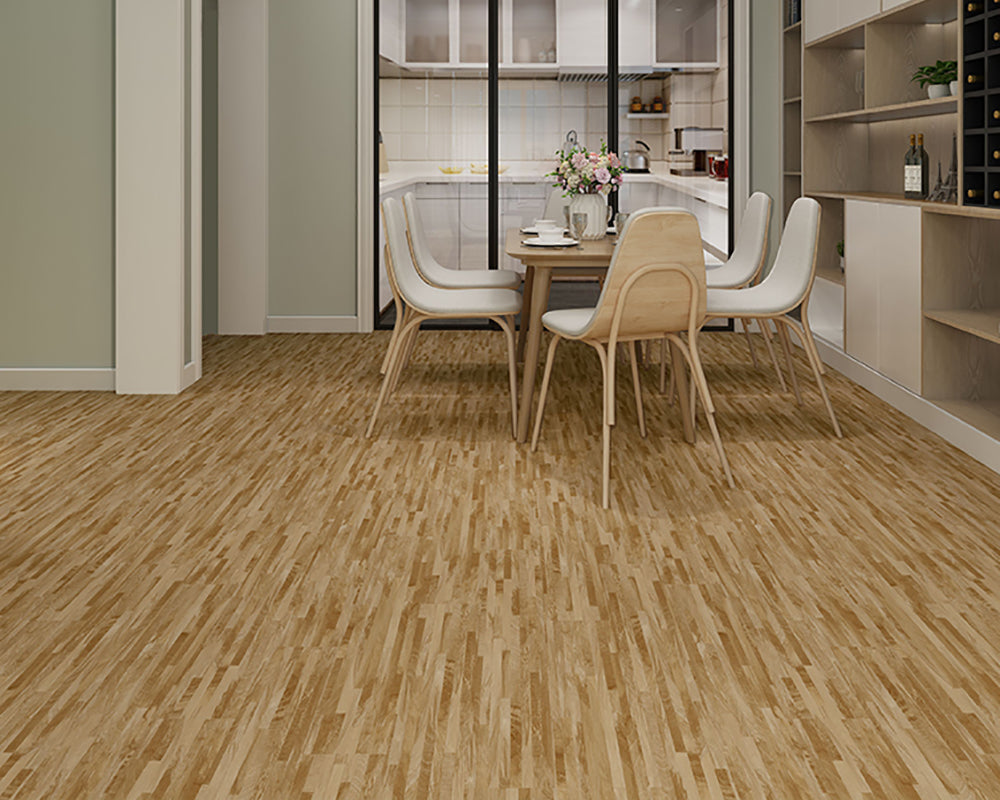 Dining area with wooden flooring, chairs, and a kitchen in the background.