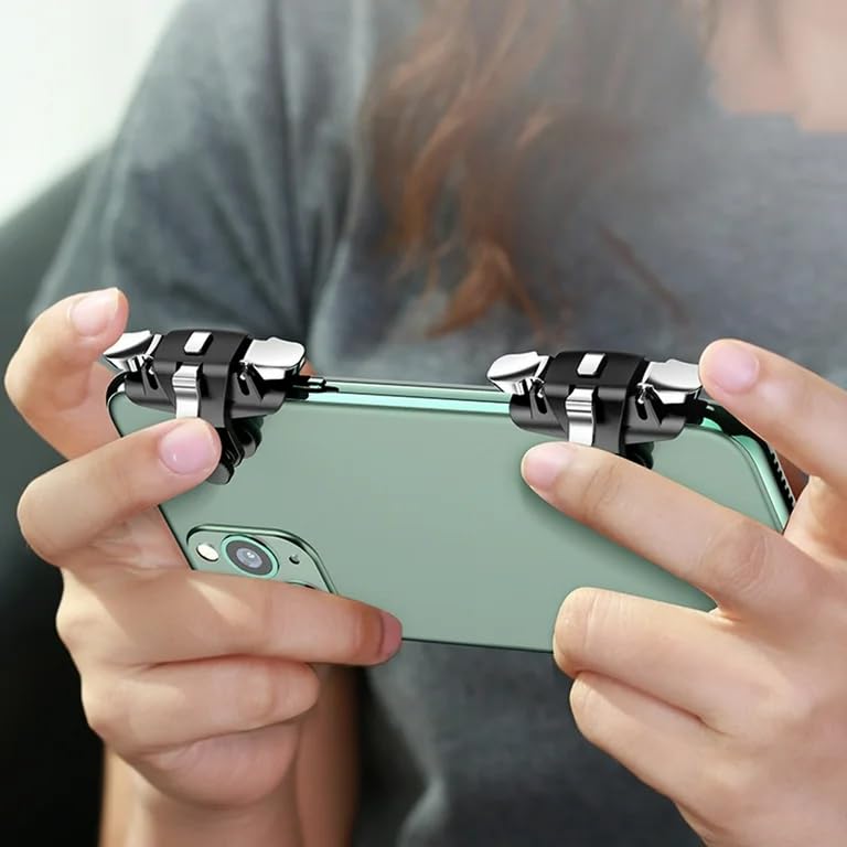 Person holding a smartphone with a gaming controller attachment.