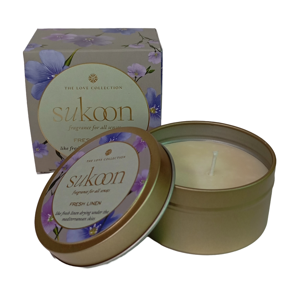 Sukoon candle in a tin with packaging on a white background