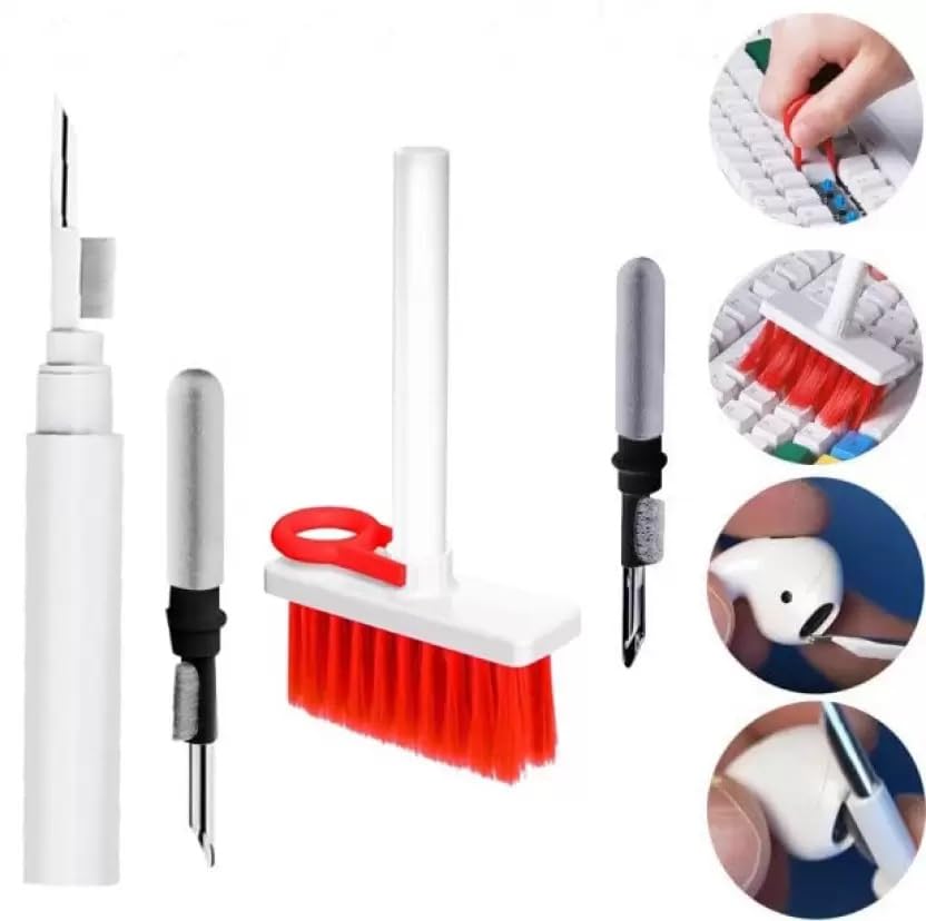 Keyboard cleaning tool set with brush and pen-like device on a white background.