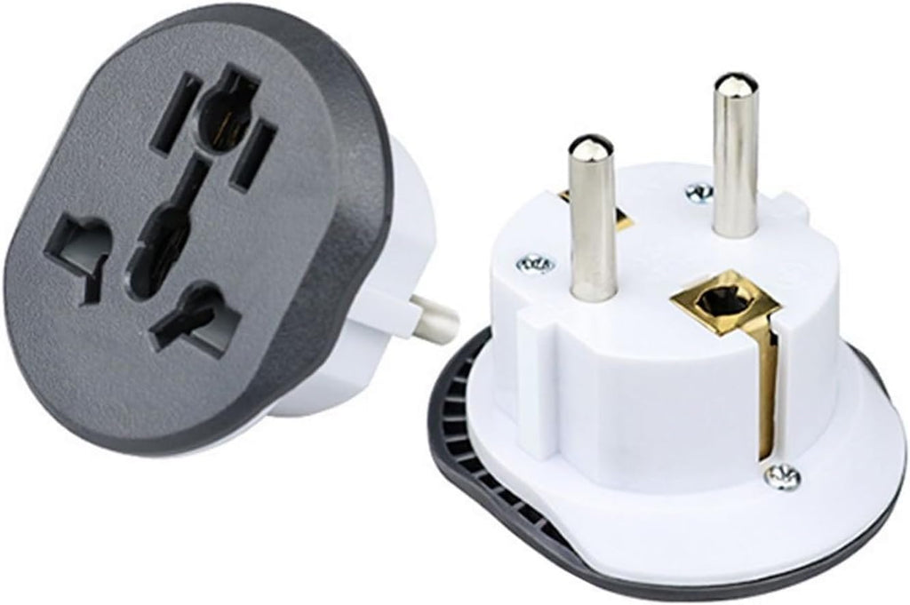 Travel adapter with black socket and white plug on a white background
