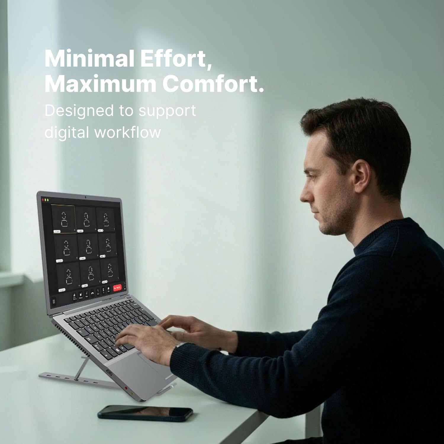 Person using a laptop with text 'Minimal Effort, Maximum Comfort' on a light background
