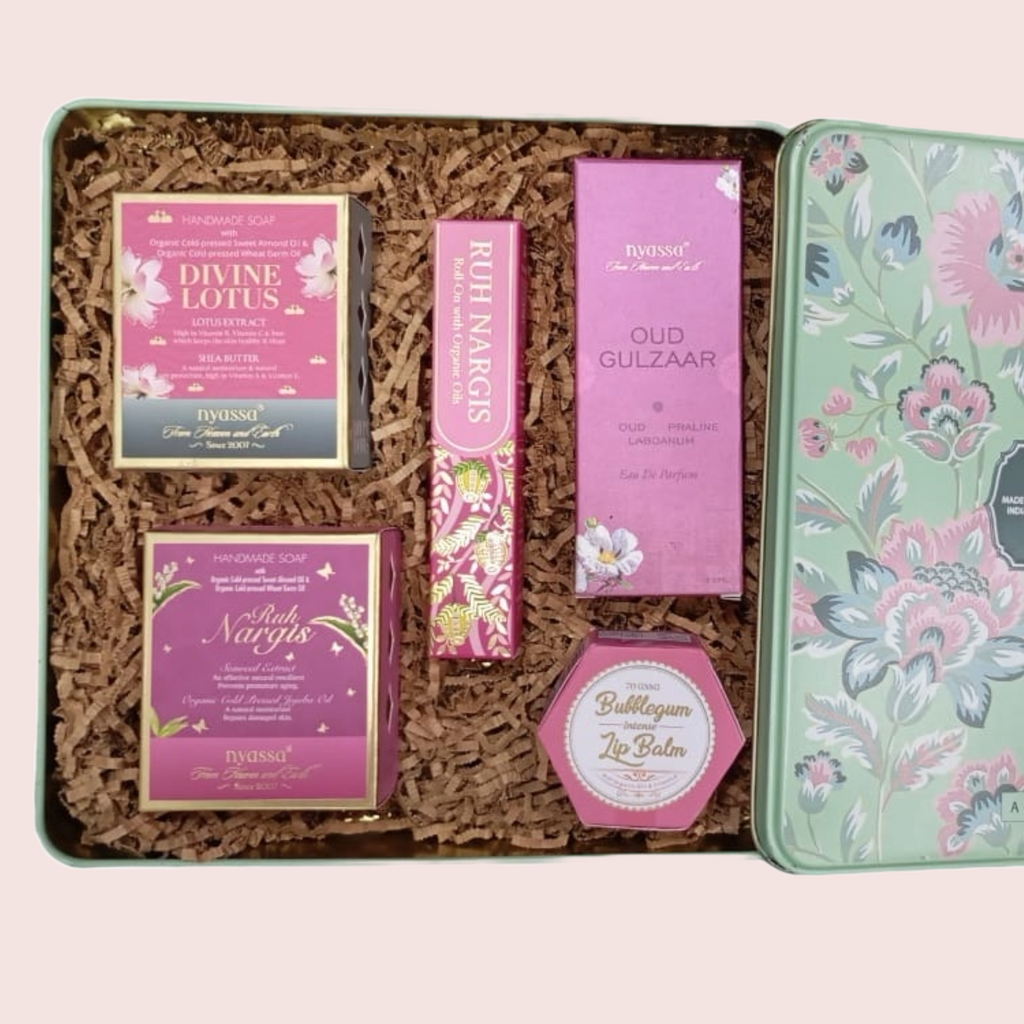 Gift set with lip balm and other products in a decorative tin