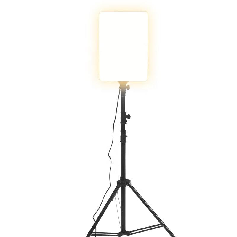 Floor lamp with a white shade on a white background
