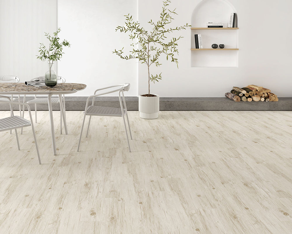 Modern interior with light wood flooring, dining table, chairs, and decorative elements.