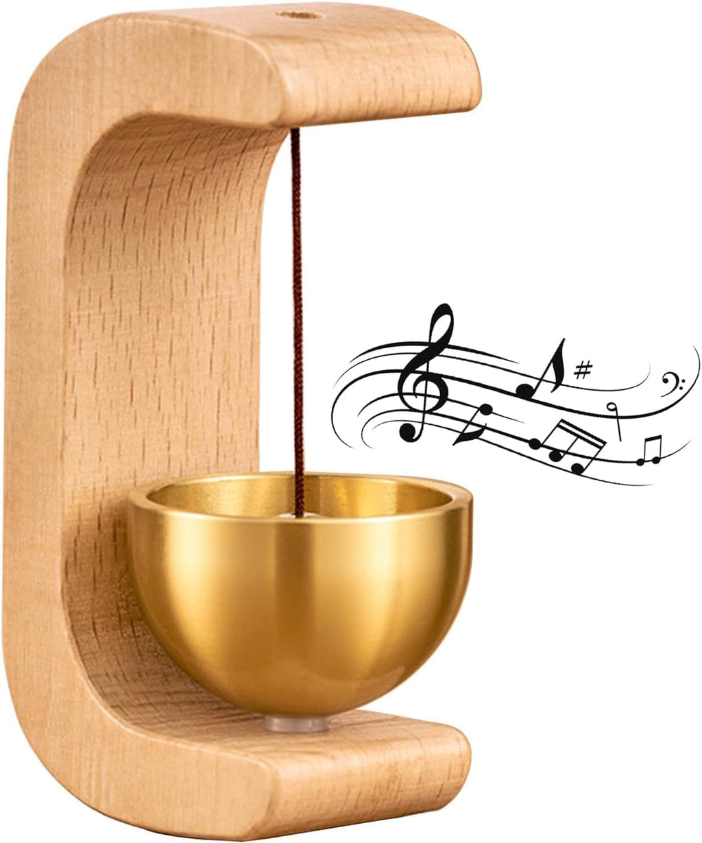 Wooden and gold bowl with musical notes on a white background