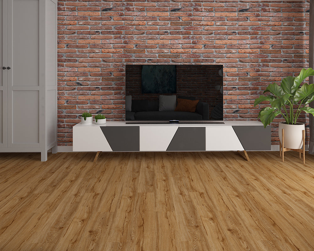 Modern living room with a brick wall, TV, and decorative plants.